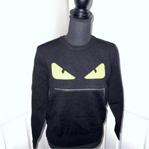 NWOT Black Sweater with Yellow Eye Design Size M